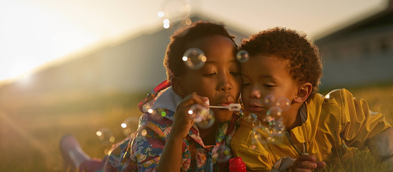 kids blowing bubbles